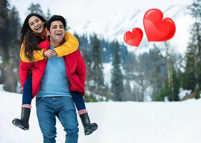 Couple on a Shikara ride during the Romantic Kashmir Honeymoon Package